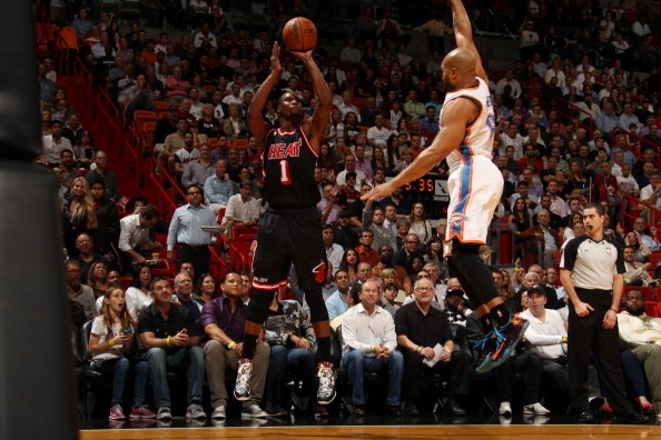 MIAMI, FL - JANUARY 29: Chris Bosh #1 of the Miami Heat shoots the ball against the Oklahoma City Thunder at the American Airlines Arena in Miami, Florida on Jan. 29, 2014. NOTE TO USER: User expressly acknowledges and agrees that, by downloading and/or u