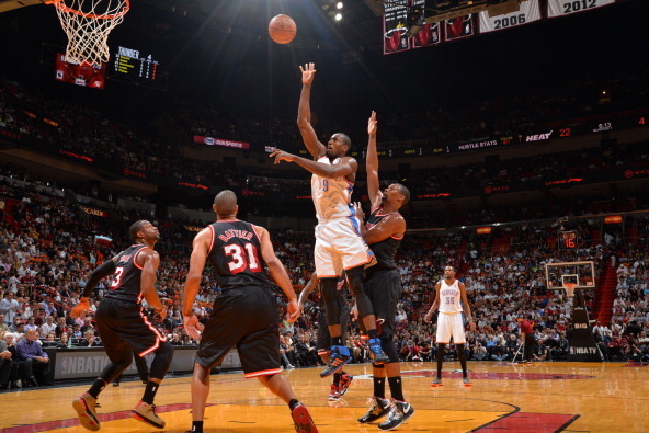 MIAMI, FL - JANUARY 29: Serge Ibaka #9 of the Oklahoma City Thunder shoots the ball against the Miami Heat at the American Airlines Arena in Miami, Florida on Jan. 29, 2014. NOTE TO USER: User expressly acknowledges and agrees that, by downloading and/or 