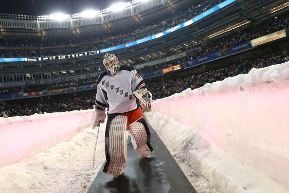 NEW YORK, NY - JANUARY 29:  (EDITORIAL USE ONLY) Goaltender Henrik Lundqvist #30 of the New York Rangers makes his way to the ice surface for the second period of the 2014 Coors Light NHL Stadium Series at Yankee Stadium on January 29, 2014 in the Bronx b