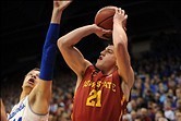 Jan 29, 2014; Lawrence, KS, USA; Iowa State Cyclones guard Matt Thomas (21) shoots a jumpshot as Kansas Jayhawks guard Brannen Greene (14) defends during the first half at Allen Fieldhouse. Mandatory Credit: Denny Medley-USA TODAY Sports