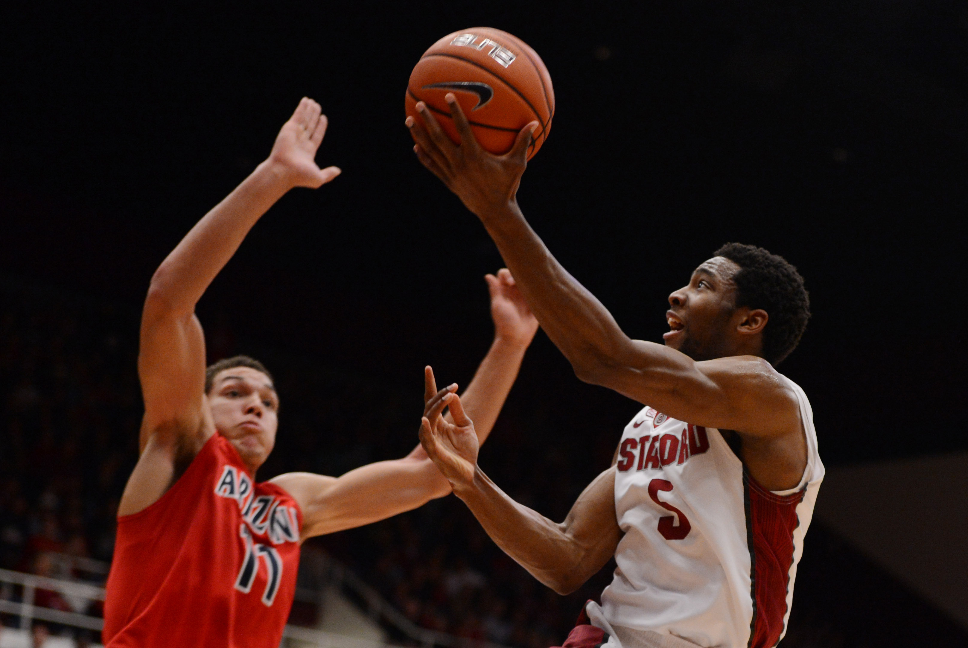 January 29, 2014; Stanford, CA, USA; Stanford Cardinal guard Chasson Randle (5) shoots the ball against Arizona Wildcats forward Aaron Gordon (11) during the first half at Maples Pavilion. Mandatory Credit: Kyle Terada-USA TODAY Sports