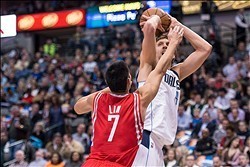 Jan 29, 2014; Dallas, TX, USA; Dallas Mavericks power forward Dirk Nowitzki (41) shoots over Houston Rockets point guard Jeremy Lin (7) during the game at American Airlines Center. Mandatory Credit: Jerome Miron-USA TODAY Sports
