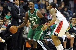 Jan 22, 2014; Washington, DC, USA; Boston Celtics small forward Jeff Green (8) dribbles the ball as Washington Wizards shooting guard Bradley Beal (3) defends during the first half at Verizon Center. Mandatory Credit: Brad Mills-USA TODAY Sports