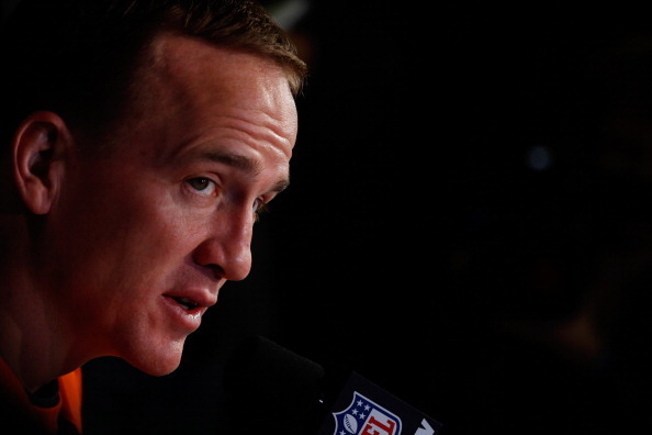 JERSEY CITY, NJ - JANUARY 29:    Peyton Manning #18 of the Denver Broncos speaks to the media during an availability January 29, 2014 in Jersey City, New Jersey. The Denver Broncos and Seattle Seahawks will meet at Super Bowl XLVIII at Metlife Stadium on 