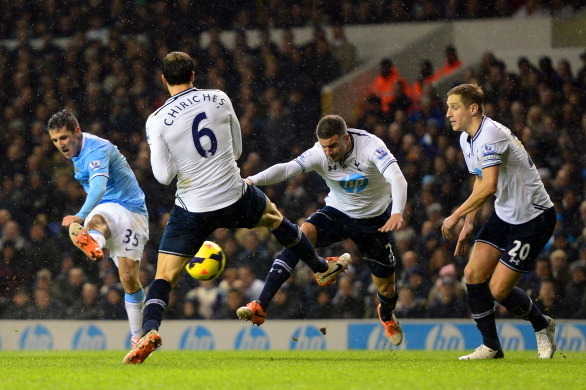 LONDON, ENGLAND - JANUARY 29:  Steven Jovetic of Manchester City scores their fourth goal during the Barclays Premier League match between Tottenham Hotspur and Manchester City at White Hart Lane on January 29, 2014 in London, England.  (Photo by Jamie Mc