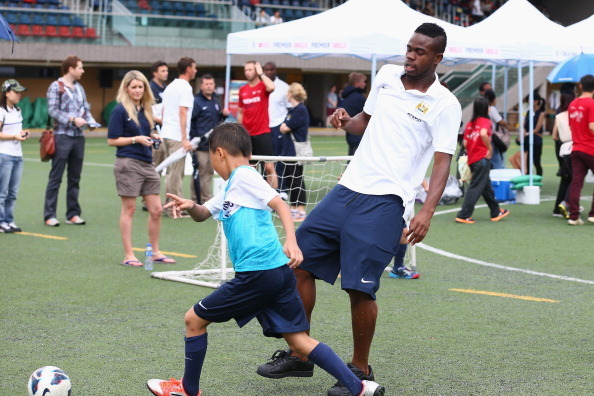HONG KONG - JULY 25:  Abdul Razak of Mancester City participates in a clinic with local children during the Barclays Asia Trophy Premier League Community Festival at  on July 25, 2013 in Hong Kong, Hong Kong.  (Photo by Robert Cianflone/Getty Images for F