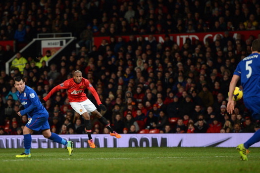 MANCHESTER, ENGLAND - JANUARY 28:  Ashley Young of Manchester United scores his team's second goal during the Barclays Premier League match between Manchester United and Cardiff City at Old Trafford on January 28, 2014 in Manchester, England.  (Photo by M