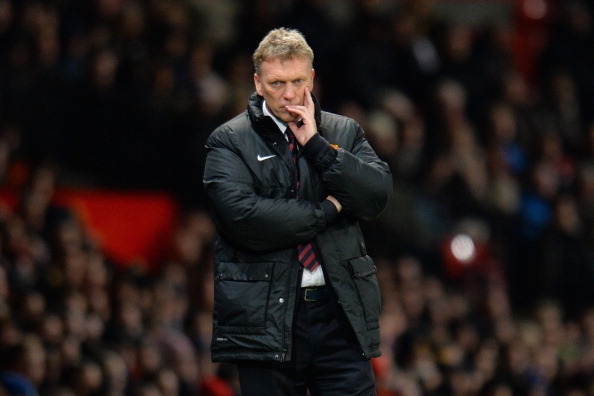 MANCHESTER, ENGLAND - JANUARY 11:  Manchester United Manager David Moyes looks on during the Barclays Premier League match between Manchester United and Swansea City at Old Trafford on January 11, 2014 in Manchester, England.  (Photo by Shaun Botterill/Ge