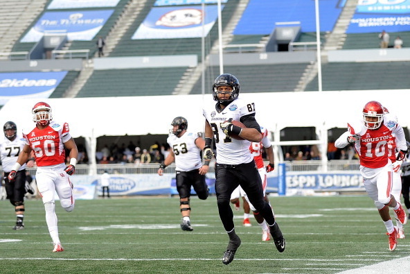 BIRMINGHAM, AL - JANUARY 04:  Jordan Matthews #87 of the Vanderbilt Commodores runs for a touchdown against the Houston Cougars during the BBVA Compass Bowl at Legion Field on January 4, 2014 in Birmingham, Alabama.  (Photo by Stacy Revere/Getty Images)