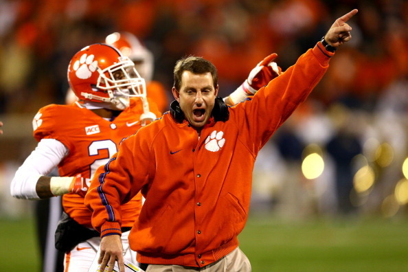CLEMSON, SC - NOVEMBER 14:  Head coach Dabo Swinney of the Clemson Tigers celebrates after a ruling on the field during their game against the Georgia Tech Yellow Jackets at Clemson Memorial Stadium on November 14, 2013 in Clemson, South Carolina.  (Photo
