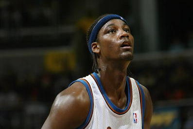 WASHINGTON - JANUARY 4:  Kwame Brown #5 of the Washington Wizards shoots a free throw against the Memphis Grizzlies during the game at MCI Center on January 4, 2004 in Washington D.C.  The Grizzlies won 103-101.  NOTE TO USER: User expressly acknowledges 