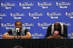 Jun 21, 2012; Miami, FL, USA; Oklahoma City Thunder point guard Russell Westbrook (left) and Kevin Durant (right) react during the post game press conference after game five of the 2012 NBA Finals at the American Airlines Arena. The Heat defeated the Okla