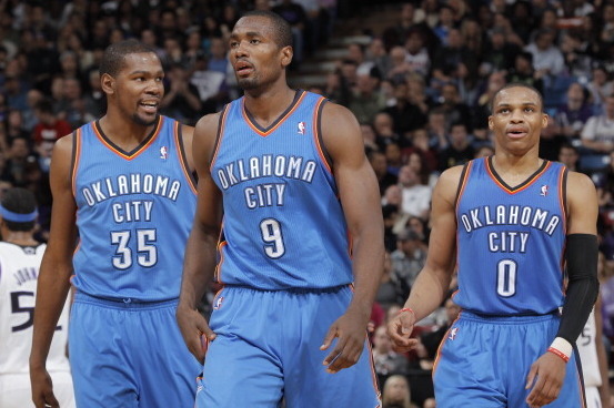 SACRAMENTO, CA - JANUARY 25:  Kevin Durant #35, Serge Ibaka #9 and Russell Westbrook #0 of the Oklahoma City Thunder face off against the Sacramento Kings on January 25, 2013 at Sleep Train Arena in Sacramento, California. NOTE TO USER: User expressly ack