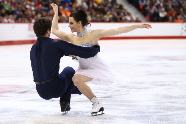 OTTAWA, ON - JANUARY 11: Tessa Virtue and Scott Moir skate in the Senior Ice Dance Free Dance during the 2014 Canadian Tire National Figure Skating Championships at Canadian Tire Centre on January 11, 2014 in Ottawa, Ontario, Canada.  (Photo by Andre Ring