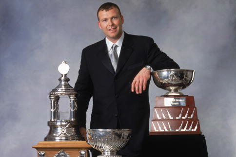 TORONTO - JUNE 12:  Martin Brodeur of the New Jersey Devils poses with the Vezina Trophy , William M. Jennings Trophy and the Stanley Cup during the 2002-03 NHL Awards at the Convention Centre on June 12, 2003 in Toronto, Ontario. (Photo By Silvia Pecota/