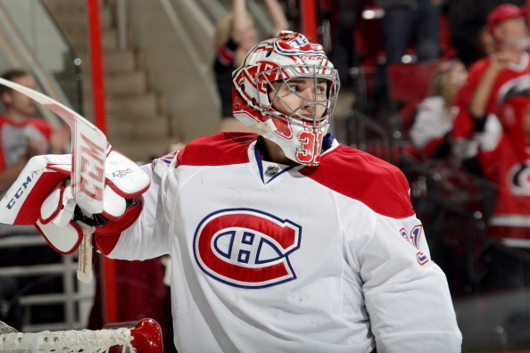 RALEIGH, NC - DECEMBER 31:  Carey Price #31 of the Montreal Canadiens looks on after giving up a goal in the third period during an NHL game against the Carolina Hurricanes at PNC Arena on December 31, 2013 in Raleigh, North Carolina.  (Photo by Gregg For