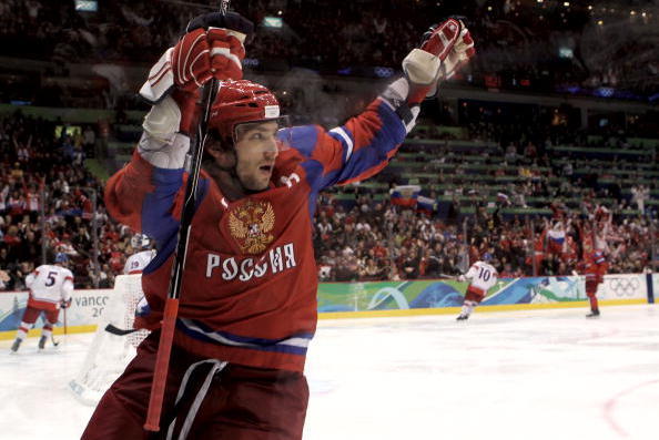 VANCOUVER, BC - FEBRUARY 21:  Alexander Ovechkin of Russian Federation celebrates after Evgeni Malkin scored a third period goal during the ice hockey men's preliminary game between Russia and Czech Republic on day 10 of the Vancouver 2010 Winter Olympics