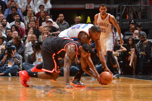 MIAMI, FL - JANUARY 29: Kevin Durant #35 of the Oklahoma City Thunder goes after a loose ball against LeBron James #6 of the Miami Heat at the American Airlines Arena in Miami, Florida on Jan. 29, 2014. NOTE TO USER: User expressly acknowledges and agrees