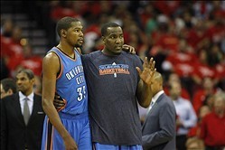 Apr 29, 2013; Houston, TX, USA; Oklahoma City Thunder small forward Kevin Durant (35) talks to center Kendrick Perkins (5) during a timeout against the Houston Rockets in the second quarter in game four of the first round of the 2013 NBA playoffs at the T