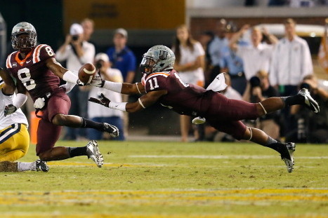 ATLANTA, GA - SEPTEMBER 26:  Kendall Fuller #11 nearly intercepts this pass as Detrick Bonner #8 of the Virginia Tech Hokies is called for defensive pass interference on B.J. Bostic #7 of the Georgia Tech Yellow Jackets at Bobby Dodd Stadium on September 