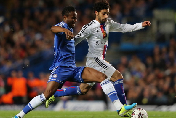 LONDON, ENGLAND - SEPTEMBER 18:  John Obi Mikel of Chelsea and Mohamed Salah of FC Basel battle for the ball  during the UEFA Champions League Group E Match between Chelsea and FC Basel at Stamford Bridge on September 18, 2013 in London, England.  (Photo 