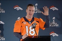 Jan 30, 2014; Jersey City, NJ, USA; Denver Broncos quarterback Peyton Manning (18) at a press conference in advance of Super Bowl XLVIII on the Cornucopia Majesty yacht on the Hudson River. Mandatory Credit: Kirby Lee-USA TODAY Sports
