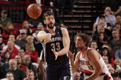 PORTLAND, OR - JANUARY 28: Marc Gasol #33 of the Memphis Grizzlies passes the ball against the Portland Trailblazers at the Moda Center Arena in Portland, Oregon. NOTE TO USER: User expressly acknowledges and agrees that, by downloading and or using this 