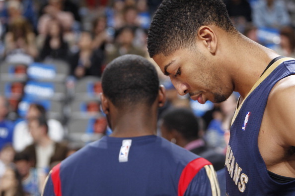 DALLAS, TX - JANUARY 11:  Anthony Davis #23 of the New Orleans Pelicans stands on the court before the game against the Dallas Mavericks on January 11, 2014 at the American Airlines Center in Dallas, Texas. NOTE TO USER: User expressly acknowledges and ag