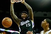 Jan 21, 2014; New Orleans, LA, USA; Sacramento Kings center DeMarcus Cousins (15) dunks over New Orleans Pelicans power forward Anthony Davis (23) during the second half of a game at New Orleans Arena. The Kings defeated the Pelicans 114-97. Mandatory Cre