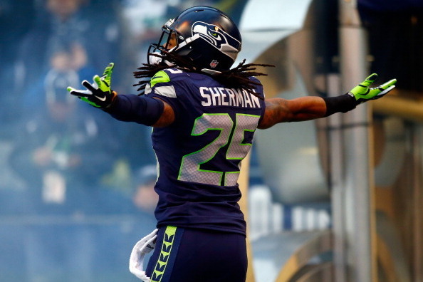 SEATTLE, WA - JANUARY 19:  Cornerback Richard Sherman #25 of the Seattle Seahawks takes the field for the 2014 NFC Championship against the San Francisco 49ers at CenturyLink Field on January 19, 2014 in Seattle, Washington.  (Photo by Jonathan Ferrey/Get