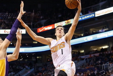 PHOENIX, AZ - JANUARY 15:  Goran Dragic #1 of the Phoenix Suns puts up a shot against the Los Angeles Lakers during the NBA game at US Airways Center on January 15, 2014 in Phoenix, Arizona.  The Suns defeated the Lakers 121-114. NOTE TO USER: User expres