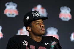 Jan 6, 2014; Pasadena, CA, USA; Florida State Seminoles quarterback Jameis Winston (5) at a press conference after the 2014 BCS National Championship game against the Auburn Tigers at the Rose Bowl.  Mandatory Credit: Kirby Lee-USA TODAY Sports