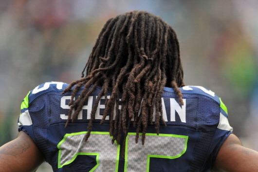 SEATTLE, WA - SEPTEMBER 22: Cornerback Richard Sherman #25 of the Seattle Seahawks watches from the sidelines as the clock winds down during the fourth quarter of the game against the Jacksonville Jaguars at CenturyLink Field on September 22, 2013 in Seat