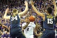 Jan 18, 2014; Manhattan, KS, USA; Kansas State Wildcats guard Marcus Foster (2) tries to get to the basket against West Virginia Mountaineers forward Kevin Noreen (34) and West Virginia Mountaineers guard Terry Henderson (15) during first-half action at F