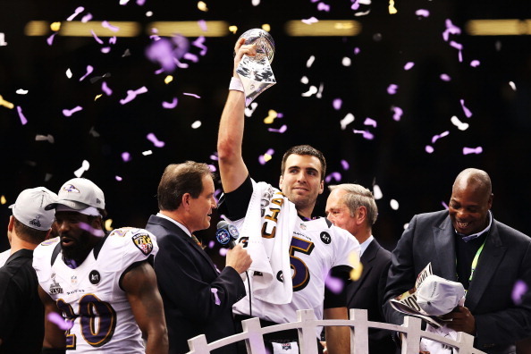NEW ORLEANS, LA - FEBRUARY 03:  Super Bowl MVP Joe Flacco #5 of the Baltimore Ravens celebrates with the Vince Lombardi trophy after the Ravens won 34-31 against the San Francisco 49ers during Super Bowl XLVII at the Mercedes-Benz Superdome on February 3,