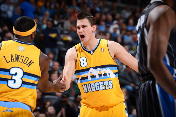 DENVER, CO - JANUARY 9:  Ty Lawson #3 of the Denver Nuggets and Danilo Gallinari #8 of the Denver Nuggets celebrate during the game between the Orlando Magic and the Denver Nuggets on January 9, 2013 at the Pepsi Center in Denver, Colorado. NOTE TO USER: 