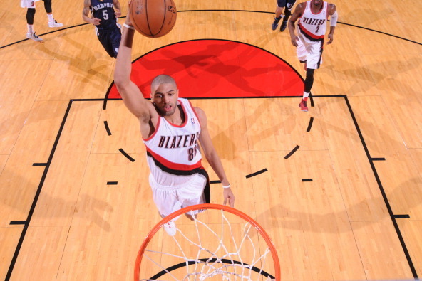 PORTLAND, OR - JANUARY 28: Nicolas Batum #88 of the Portland Trailblazers dunks the ball against the Memphis Grizzlies at the Moda Center Arena in Portland, Oregon. NOTE TO USER: User expressly acknowledges and agrees that, by downloading and or using thi