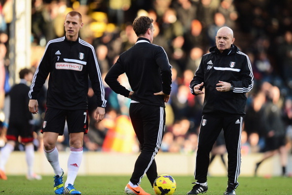LONDON, ENGLAND - JANUARY 11:  Fulham assistant head coach Ray Wilkins (L) talks with Scott Parker (C) and Steve Sidwell (L) during the Barclays Premier League match between Fulham and Sunderland at Craven Cottage on January 11, 2014 in London, England.  
