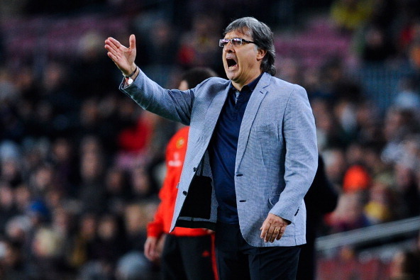 BARCELONA, SPAIN - DECEMBER 14:  Head coach Gerardo 'Tata' Martino of FC Barcelona reacts during the La Liga match between FC Barcelona and Villarreal CF at Camp Nou on December 14, 2013 in Barcelona, Spain.  (Photo by David Ramos/Getty Images)