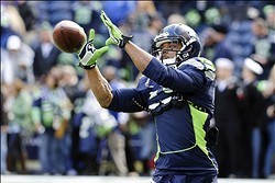 Nov 17, 2013; Seattle, WA, USA; Seattle Seahawks wide receiver Percy Harvin (11) catches a pass during pre game warm ups prior to the game against the Minnesota Vikings at CenturyLink Field. Mandatory Credit: Steven Bisig-USA TODAY Sports