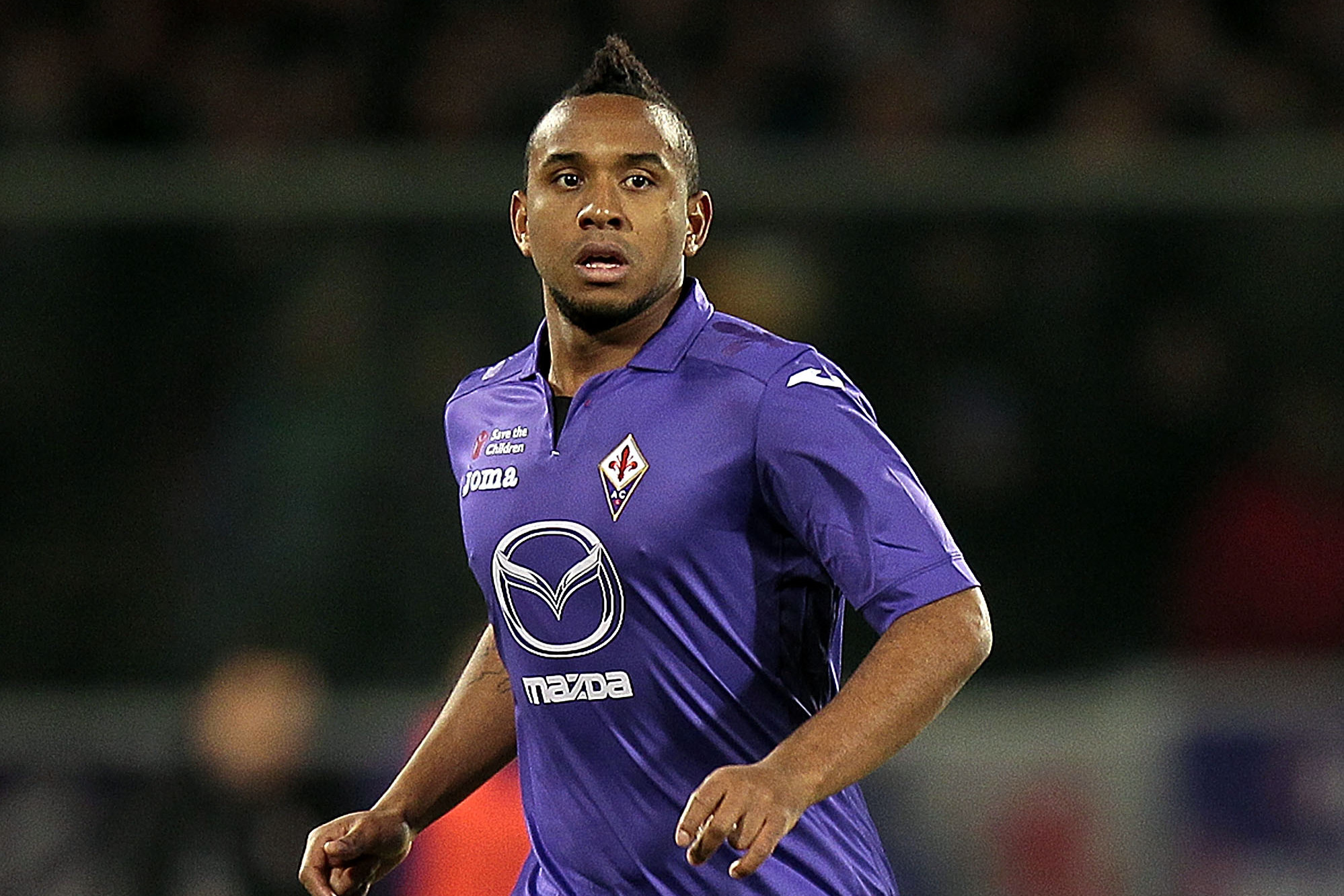 FLORENCE, ITALY - JANUARY 26: Anderson of ACF Fiorentina in action during the Serie A match between ACF Fiorentina and Genoa CFC at Stadio Artemio Franchi on January 26, 2014 in Florence, Italy.  (Photo by Gabriele Maltinti/Getty Images)