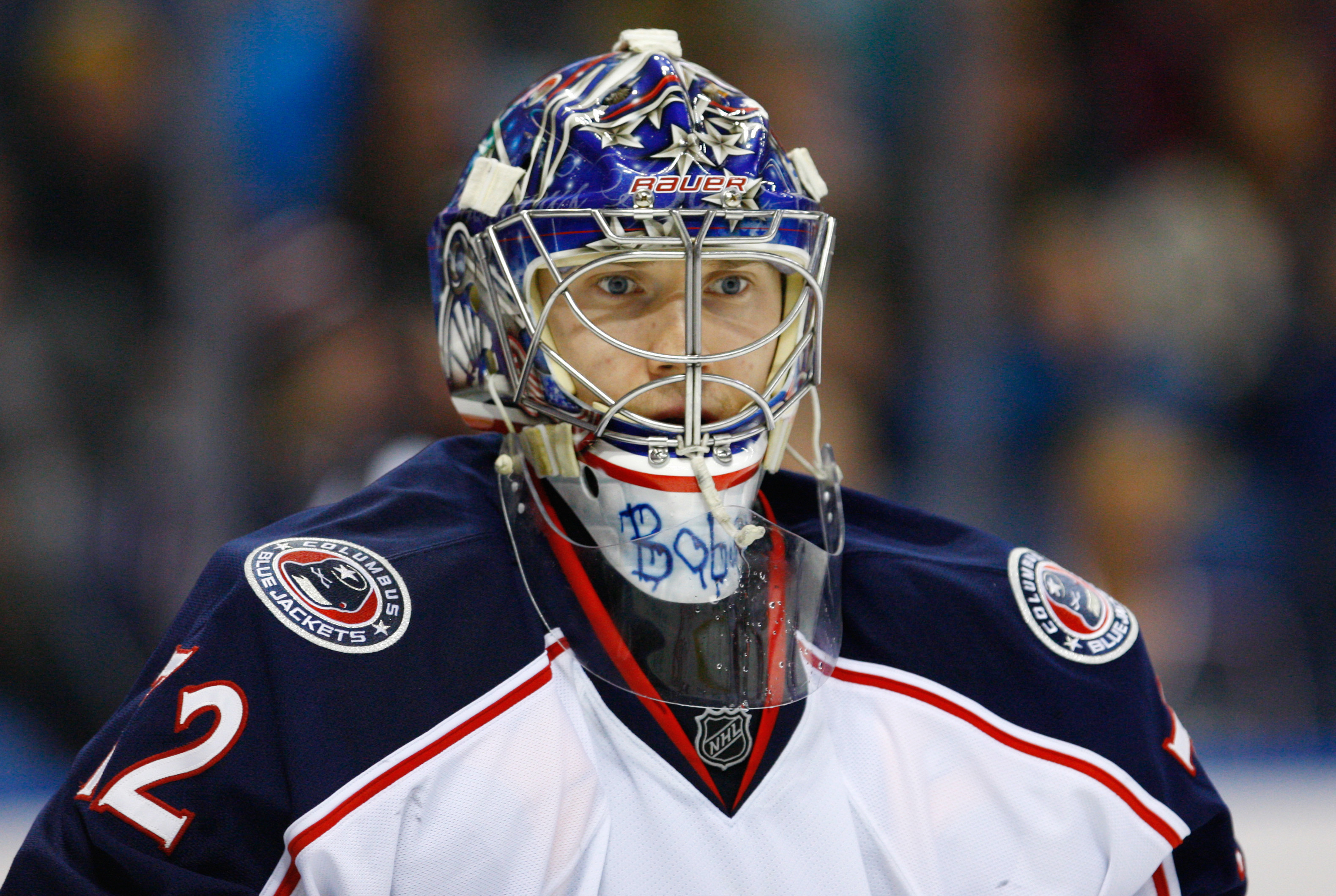 Jan 18, 2014; Buffalo, NY, USA; Columbus Blue Jackets goalie Sergei Bobrovsky (72) looks for the puck during the second period against the Buffalo Sabres at First Niagara Center. Mandatory Credit: Timothy T. Ludwig-USA TODAY Sports
