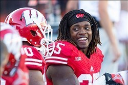 Oct 12, 2013; Madison, WI, USA; Wisconsin Badgers running back Melvin Gordon (25) during the game against the Northwestern Wildcats at Camp Randall Stadium.  Wisconsin won 35-6.  Mandatory Credit: Jeff Hanisch-USA TODAY Sports