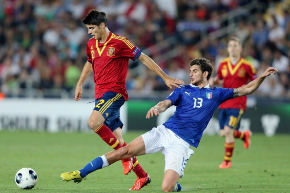 JERUSALEM, ISRAEL - JUNE 18:  Matteo Bianchetti of Italy tries to tackle Alvaro Morata of Spain during the UEFA European U21 Championships Final match between Spain and Italy at Teddy Stadium on June 18, 2013 in Jerusalem, Israel.  (Photo by Ian Walton/Ge