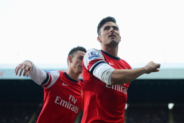 NEWCASTLE UPON TYNE, ENGLAND - DECEMBER 29:  Olivier Giroud of Arsenal celebrates scoring the opening goal during the Barclays Premier League match between Newcastle United and Arsenal at St James' Park on December 29, 2013 in Newcastle upon Tyne, England