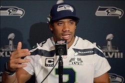 Jan 30, 2014; Jersey City, NJ, USA; Seattle Seahawks quarterback Russell Wilson (3) at a press conference at The Westin in advance of Super Bowl XLVIII. Mandatory Credit: Kirby Lee-USA TODAY Sports