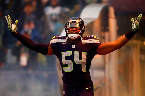 SEATTLE, WA - JANUARY 19:  Middle linebacker Bobby Wagner #54 of the Seattle Seahawks runs out of the tunnel before taking on the San Francisco 49ers during the 2014 NFC Championship at CenturyLink Field on January 19, 2014 in Seattle, Washington.  (Photo