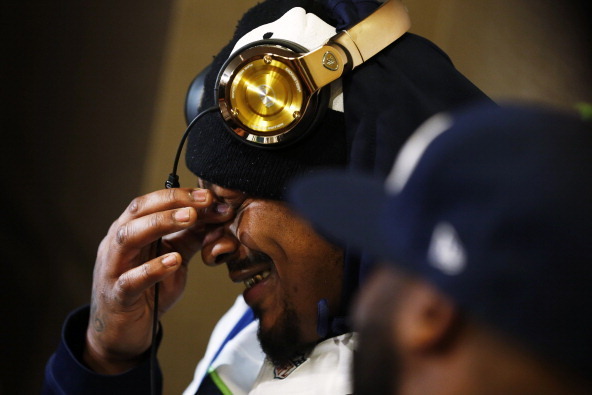 JERSEY CITY, NJ - JANUARY 29:    Marshawn Lynch #24 of the Seattle Seahawks sits in front of the media during an availability January 29, 2014 in Jersey City, New Jersey. The Denver Broncos and Seattle Seahawks will meet at Super Bowl XLVIII at Metlife St