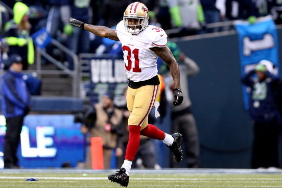 SEATTLE, WA - JANUARY 19:  Strong safety Donte Whitner #31 of the San Francisco 49ers reacts in the first half while taking on the Seattle Seahawks during the 2014 NFC Championship at CenturyLink Field on January 19, 2014 in Seattle, Washington.  (Photo b