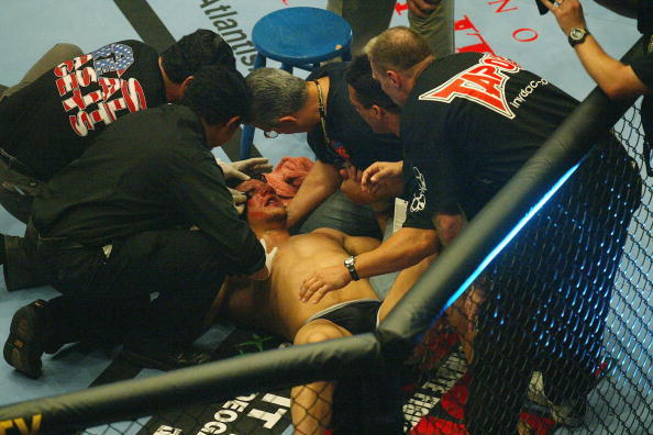 LONDON - JULY 13:  Frank Mir of the USA gets treament after he fights with Ian Freeman of Great Britain and loses during the Ultimate Fighting Championship, 'Brawl in the Royal Albert Hall', in the Royal Albert Hall London, England on July 13, 2002. (Phot